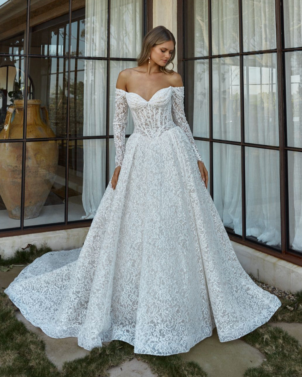 bella in wedding dress BRIE – Maya Elaria Scalloped Belted Jumpsuit COLOR:Black Calf Moda Bella Bridal dresses OLYAS